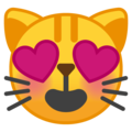 Эмодзи 😻 Улыбающееся лицо кошки с влюбленными глазами на Google Android